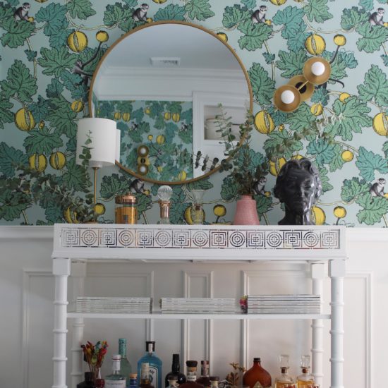 wallpaper with mirror and bar cart